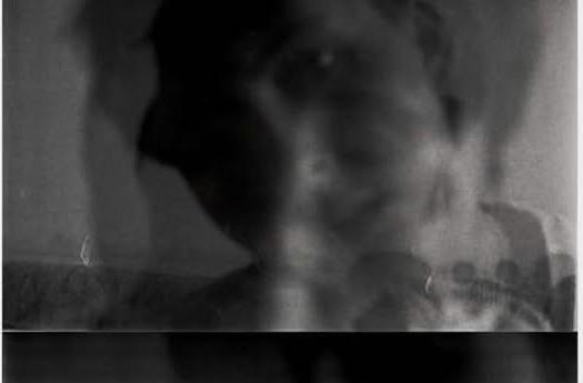 black and white self portrait, first frame