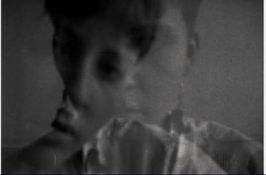 black and white self portrait, third frame